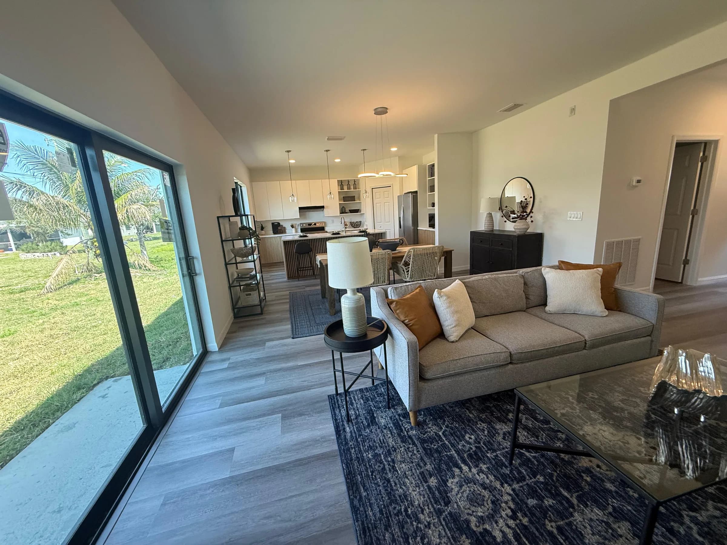 Completed open-plan Sunbright interior with living, dining, and kitchen areas